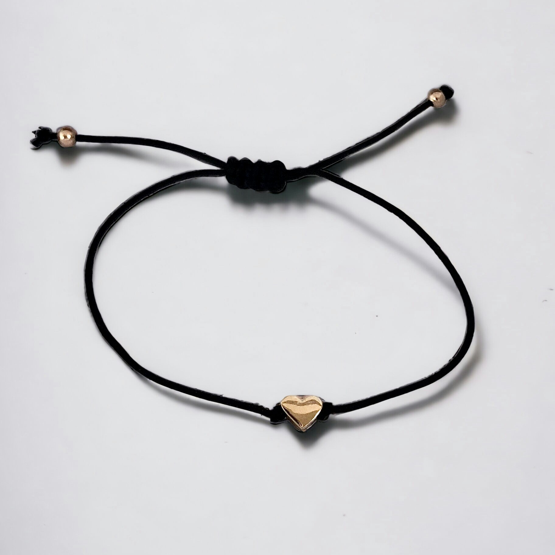 Ställbart armband med guldhjärta
