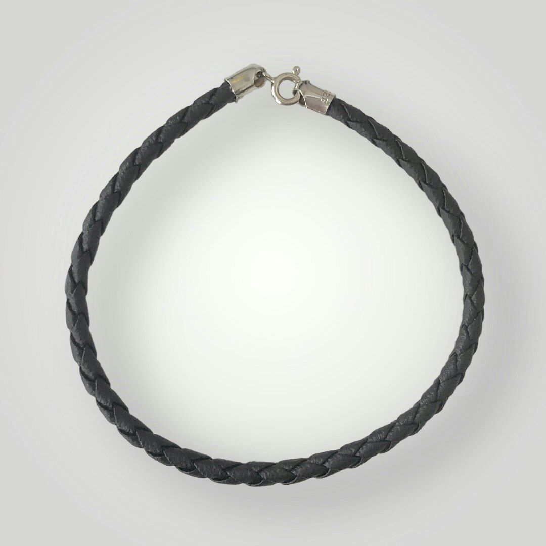 Flätat armband i konstläder och silver