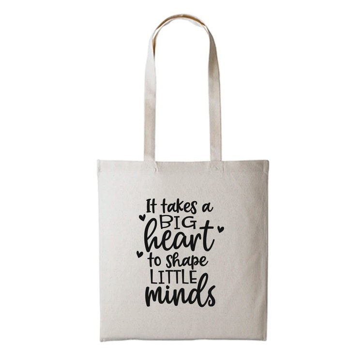 Tygkasse med tryck  "It Takes a Big Heart to Shape Little Minds"