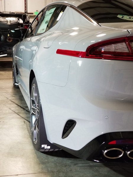 Kia Stinger black mud flaps with white logos