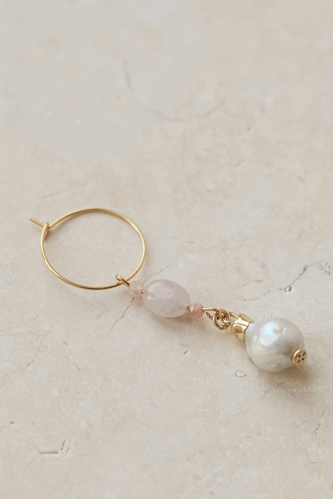 Earring with a large pearl