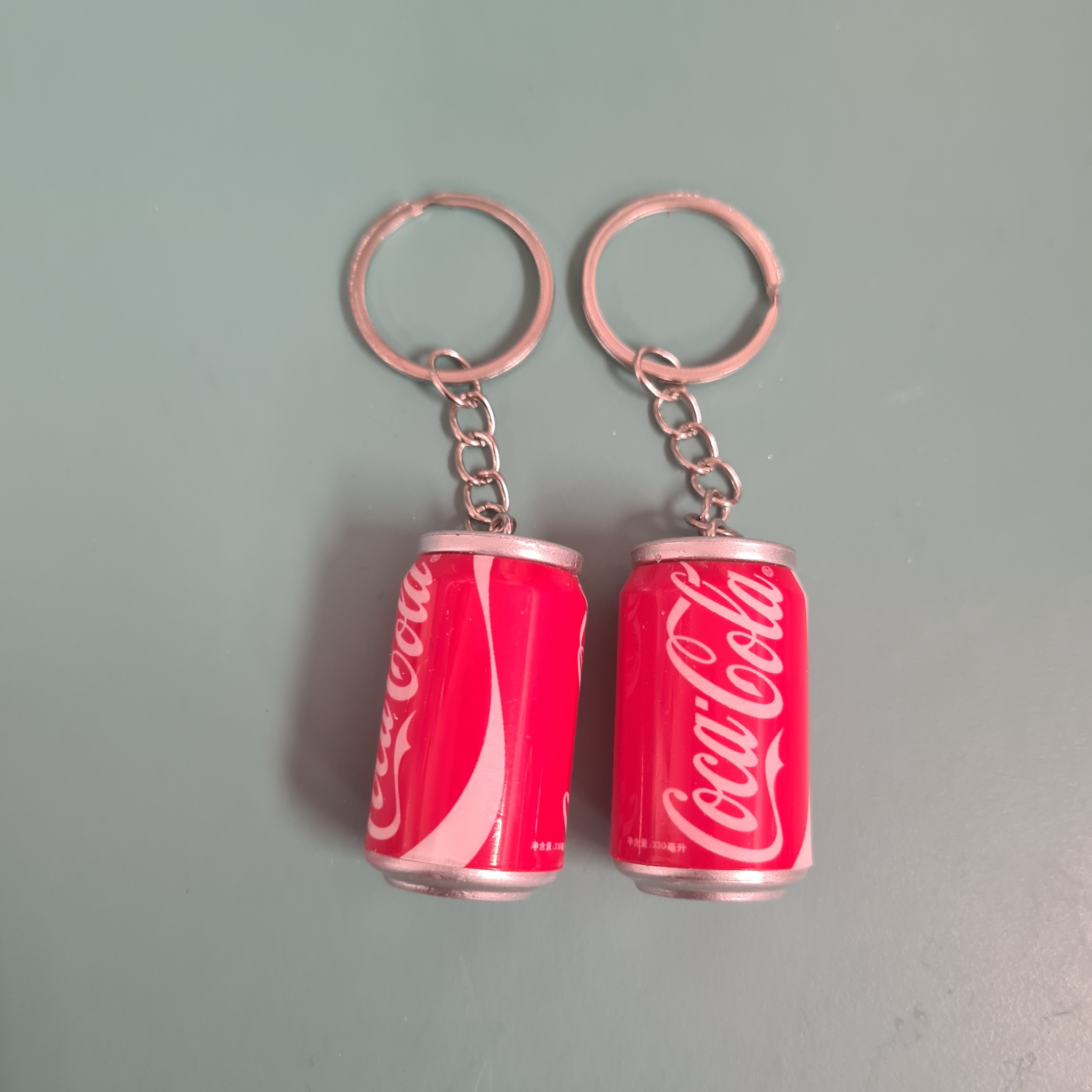 Nyckelring  Coca-Cola  pris  för 2 st