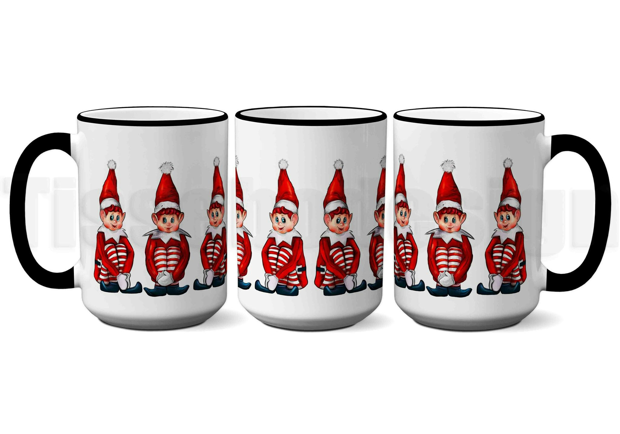 Vit mugg med svart handtag och kant samt motiv av en glad elf i grönt och vitt tryck, porslin 450 ml, tryck på båda sidor.