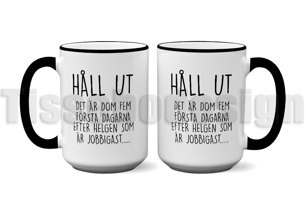 En vit 450 ml mugg med svart kant och svart handtag, trycket med texten håll ut
