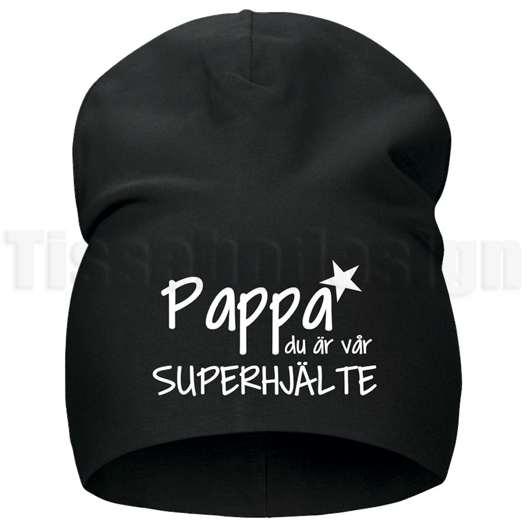 Mössa med texten Pappa du är vår superhjälte med stjärna – en varm och kärleksfull present till pappa