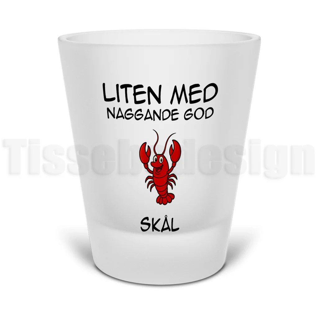 Snapsglas i frostat glas med kräfta och tryckt text Liten med naggande god samt Skål – humoristiskt festmotiv