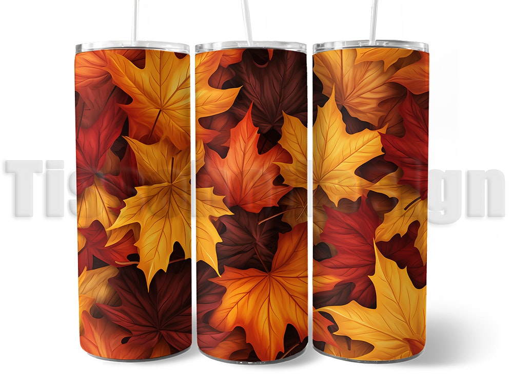 Tumbler - termomugg med ett vackert motiv av färgglada höstlöv i varma toner, isolerad för varma och kalla drycker, med sugrör och rengöringsborste.