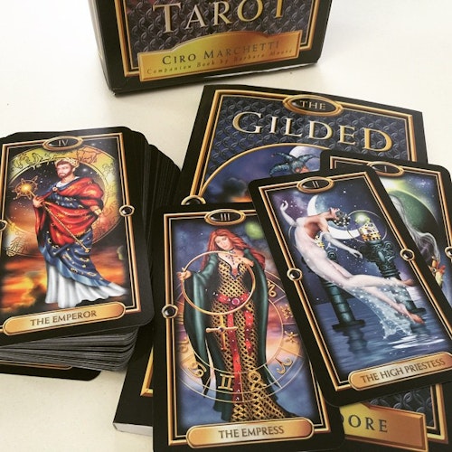 Gilded Tarot deck and guidebook by Ciro Marchetti