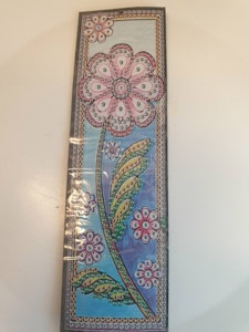 Ett bokmerke blomst påstilk