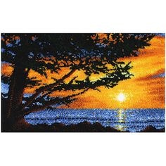 Stort knyteteppe solnedgang ferdig montert bunn med bakstykke 109x66 cm