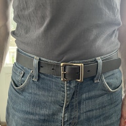 Dark brown leather belt with brass buckle