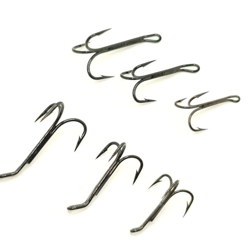 Esmond Drury tying treble hooks