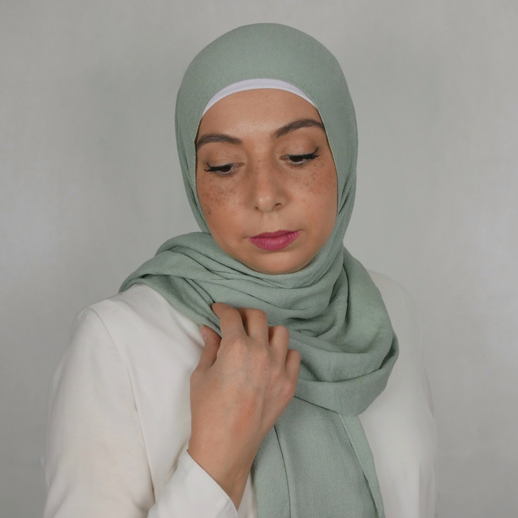Mio jazz hijab. En blandning av mjukt tyg i färgen mint