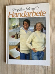En gyllene bok om handarbete.