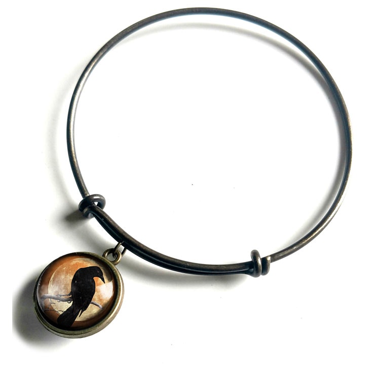Armband – Kråkfågel, orange måne