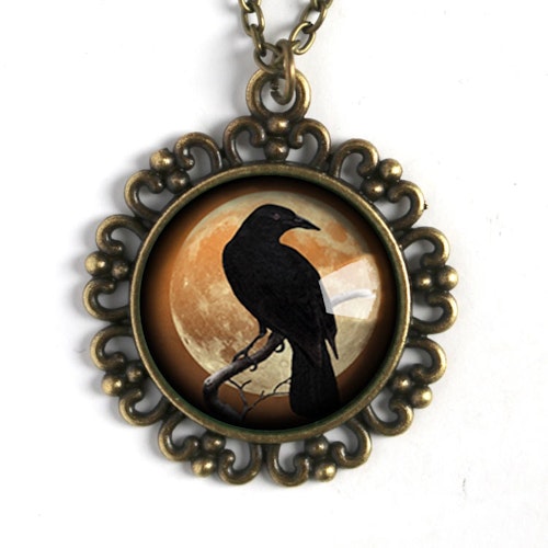 Halsband, stor berlock – Kråkfågel, orange måne