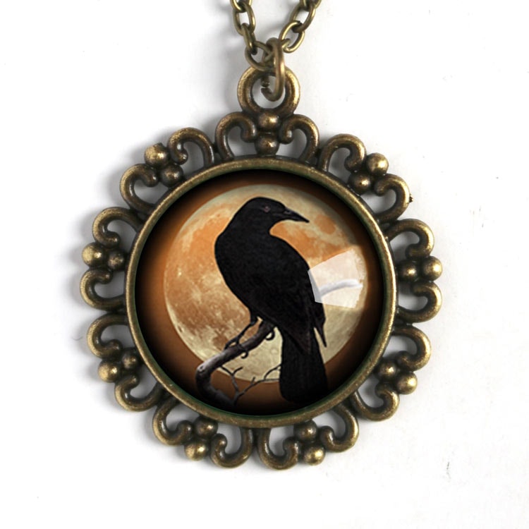 Halsband, stor berlock – Kråkfågel, orange måne