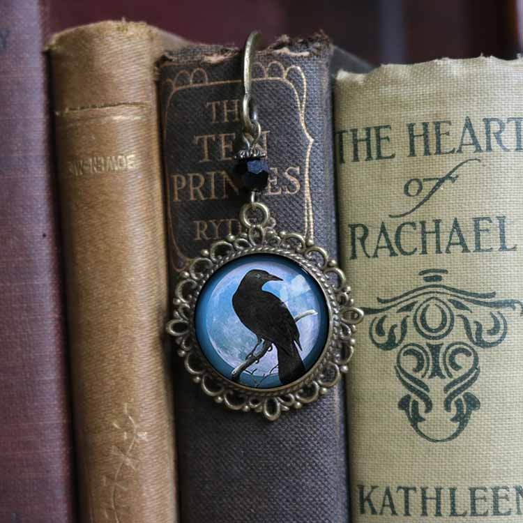 Bokmärke, book hook – Kråkfågel, blå måne