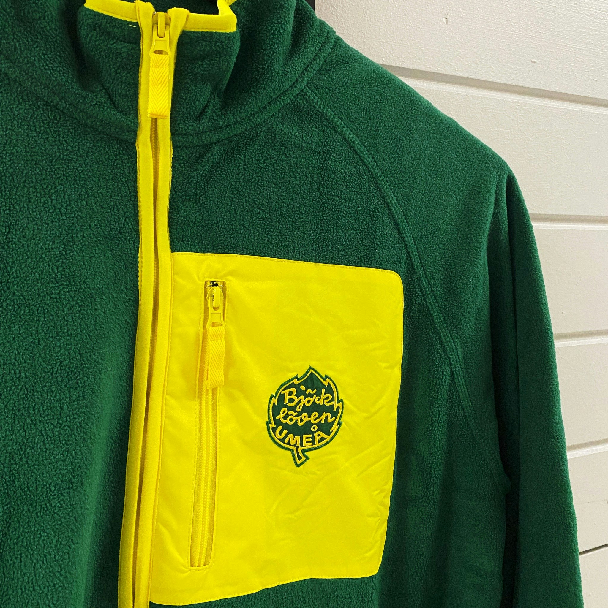 LÖVEN FLEECE GRÖN