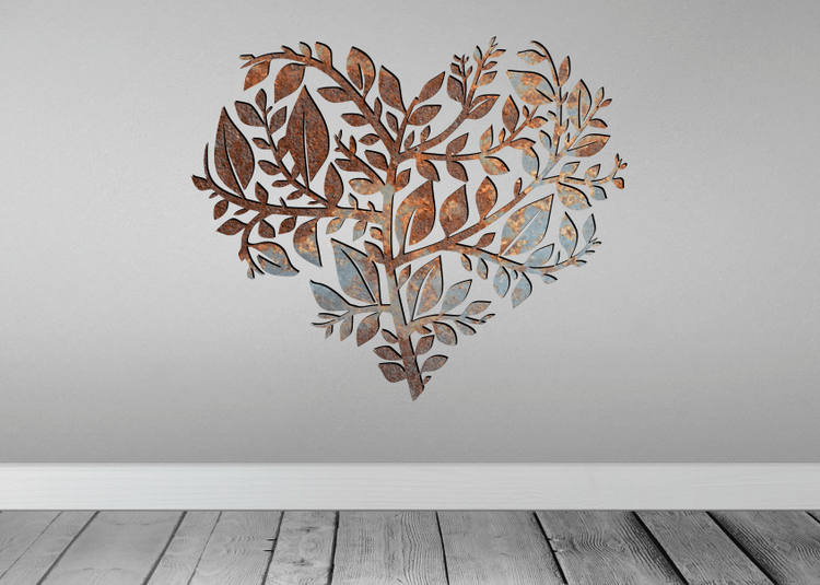 Snygg väggdekor i form av ett hjärta av löv.
