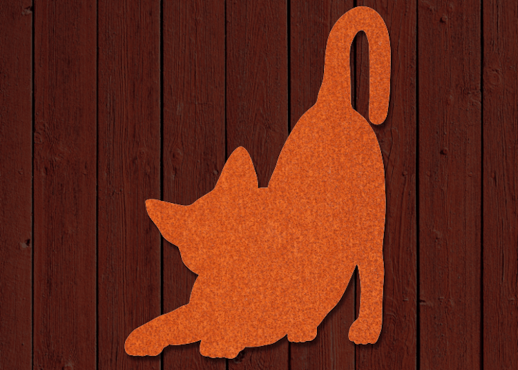 Katt i siluettform i orangeröd Cortenplåt.