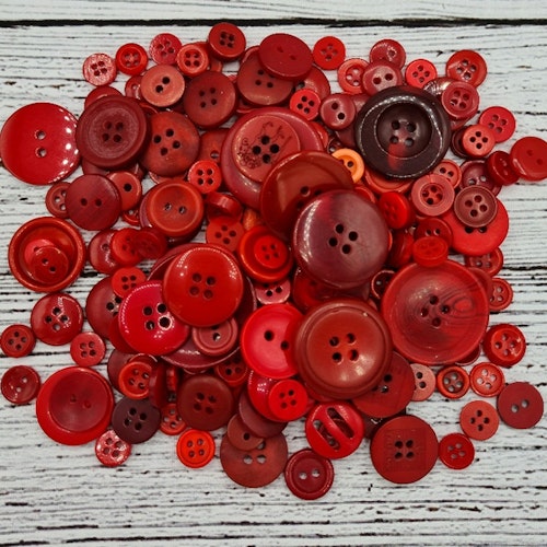 Röda knappar, mixade 80 g. (ca 120 st)