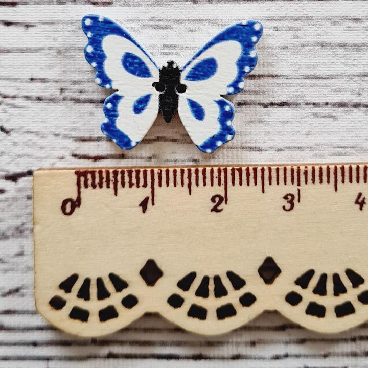 Fjäril, blå/vit, 2,5 cm