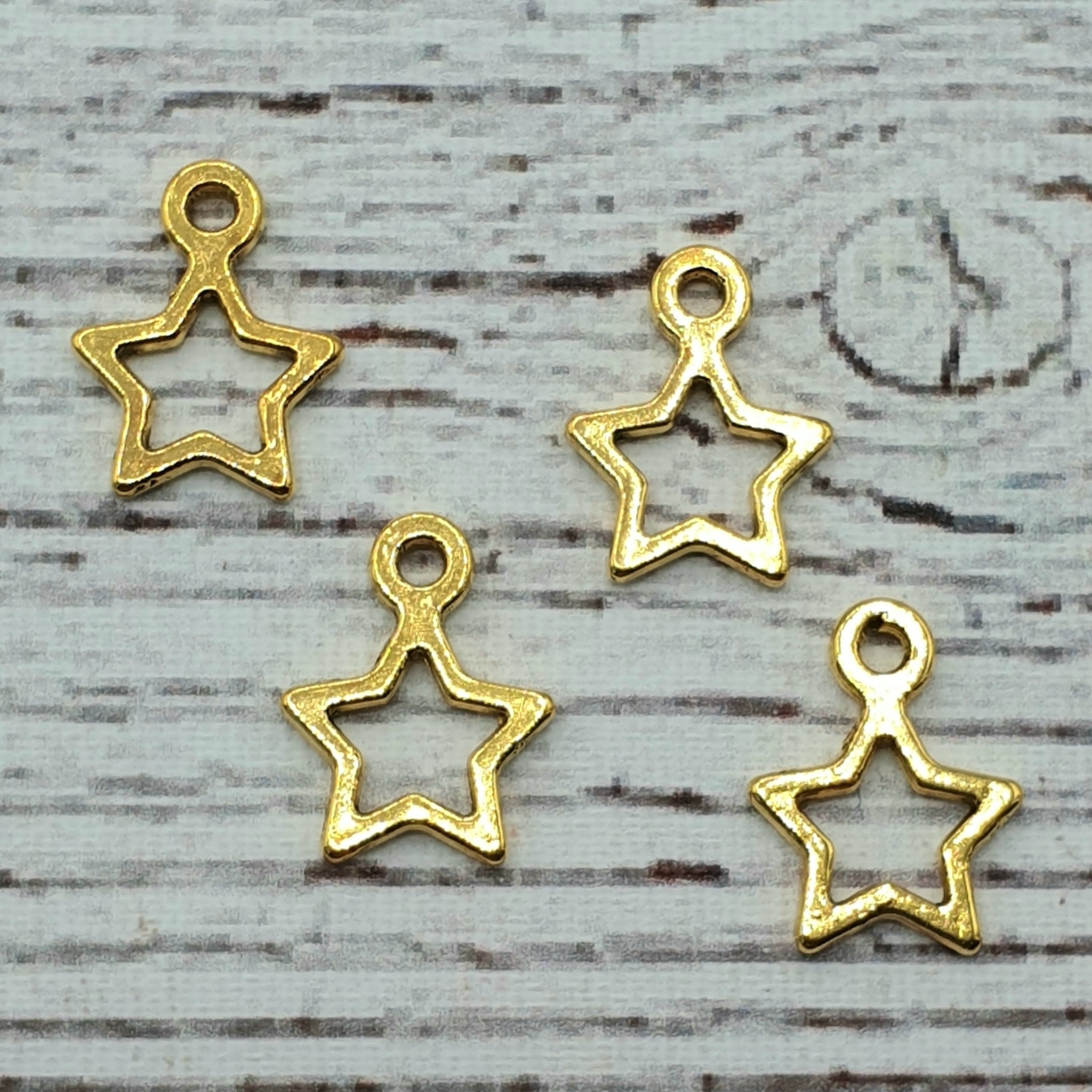 Berlock, Stjärna Guld, 1,4 cm. 1st, 25st, 50st,100st