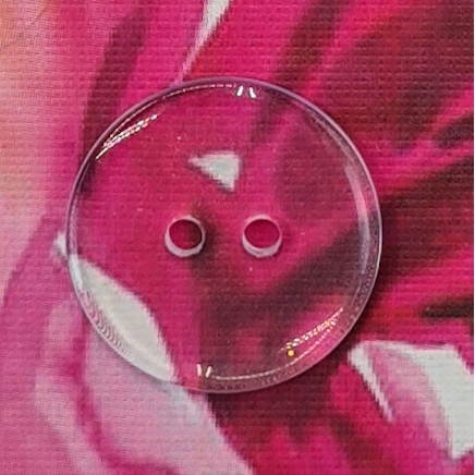 Genomskinlig, "bakside"-knapp, 2 cm.