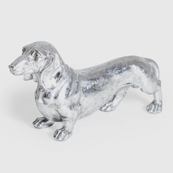 Hundskulptur, Tax