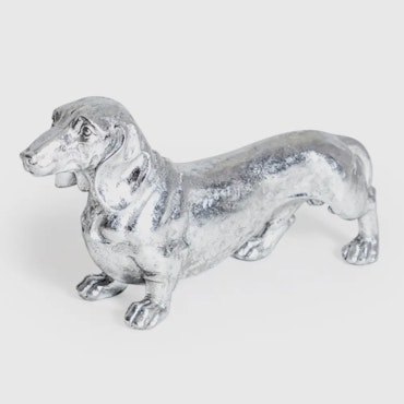 Hundskulptur, Tax