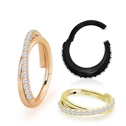 Clicker ring 1,2mm i PVD-pläterad titanium - korsad front med kubisk zirconia