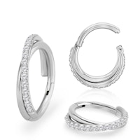 Clicker ring 1,2mm i titanium med korsad front och kubisk zirconia