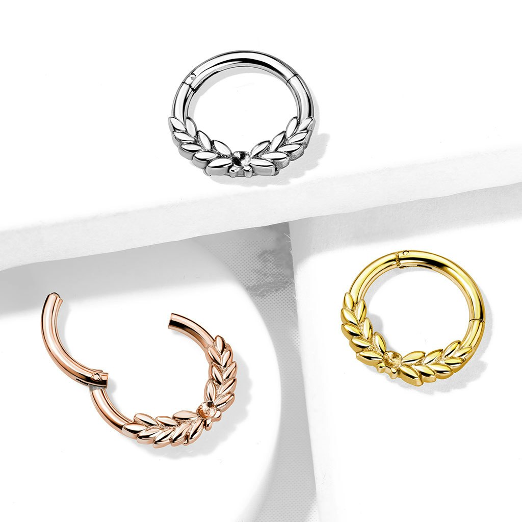 Clicker ring 1,2mm i kirurgiskt stål med löv (8mm)