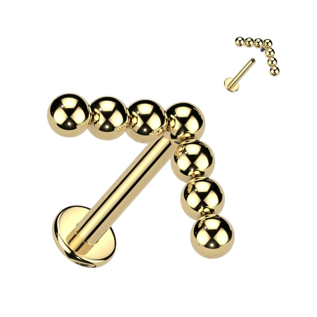Labret / flat back piercing i titanium 1,2mm med V-formad bollkluster