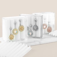 Liten ask med 3st navelsmycken med kubisk zirconia