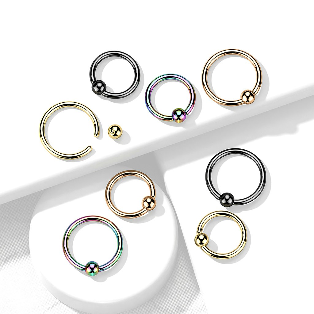 Ring med kulstängning - PVD-pläterad titanium 1,2mm med 3mm kula
