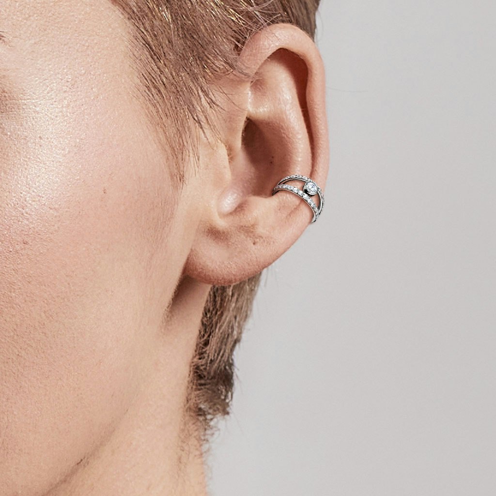 Clicker ring i kirurgiskt stål 1,2mm - centrerad kubisk zirconia och dubbel crystalklädd hoop