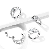 Clicker ring i kirurgiskt stål 1,2mm - centrerad kubisk zirconia och dubbel crystalklädd hoop