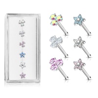 Liten ask med 6st nässmycken med treenighet och blomformade toppar med cubic zirconia