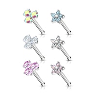 Liten ask med 6st nässmycken med treenighet och blomformade toppar med cubic zirconia