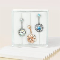 Liten ask med 3st navelpiercingar - olika modeller med kubisk zirconia