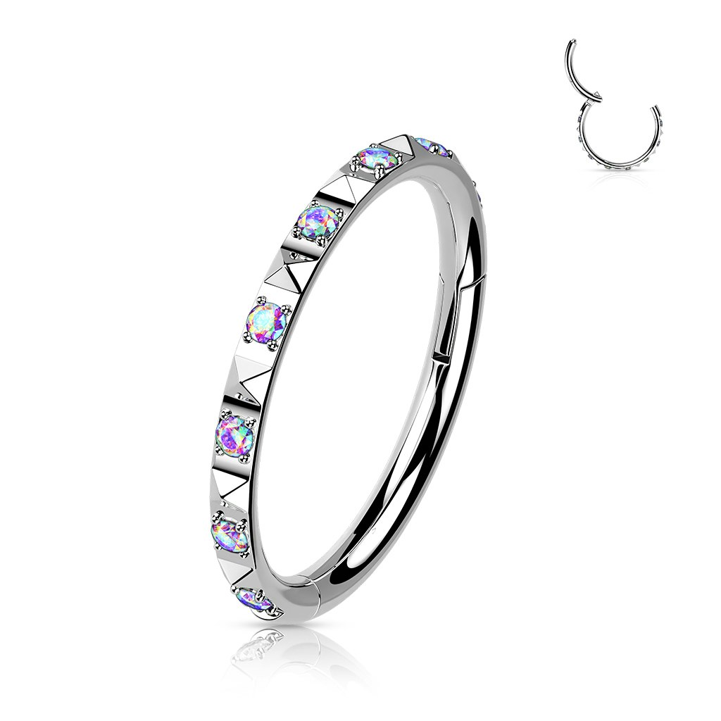 Clicker ring i titan 1,2mm med pyramidslipad ytterkant och kubisk zirconia
