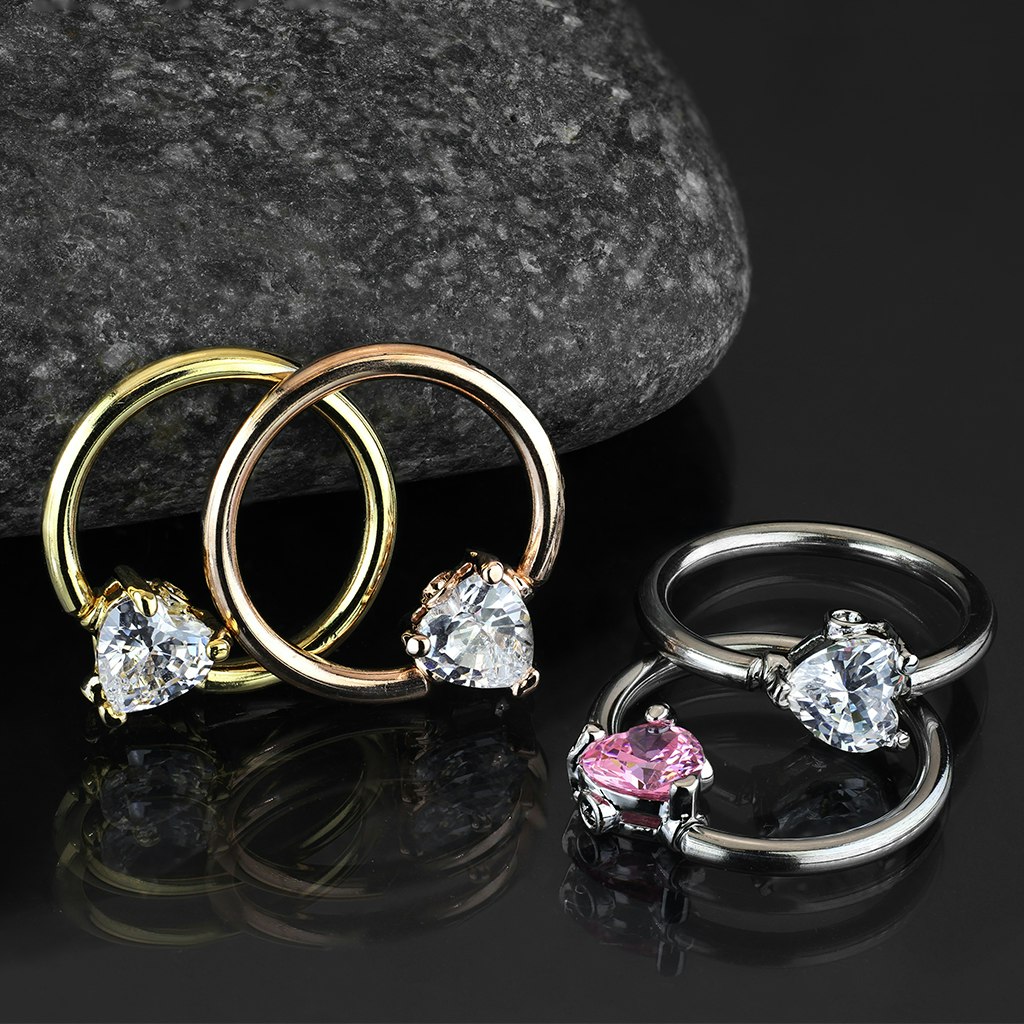 Ring 1,2mm med 3mm hjärtformad kubisk zirconia stängning