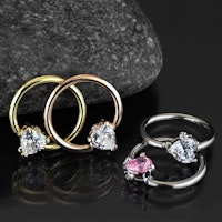 Ring 1,2mm med 3mm hjärtformad kubisk zirconia stängning