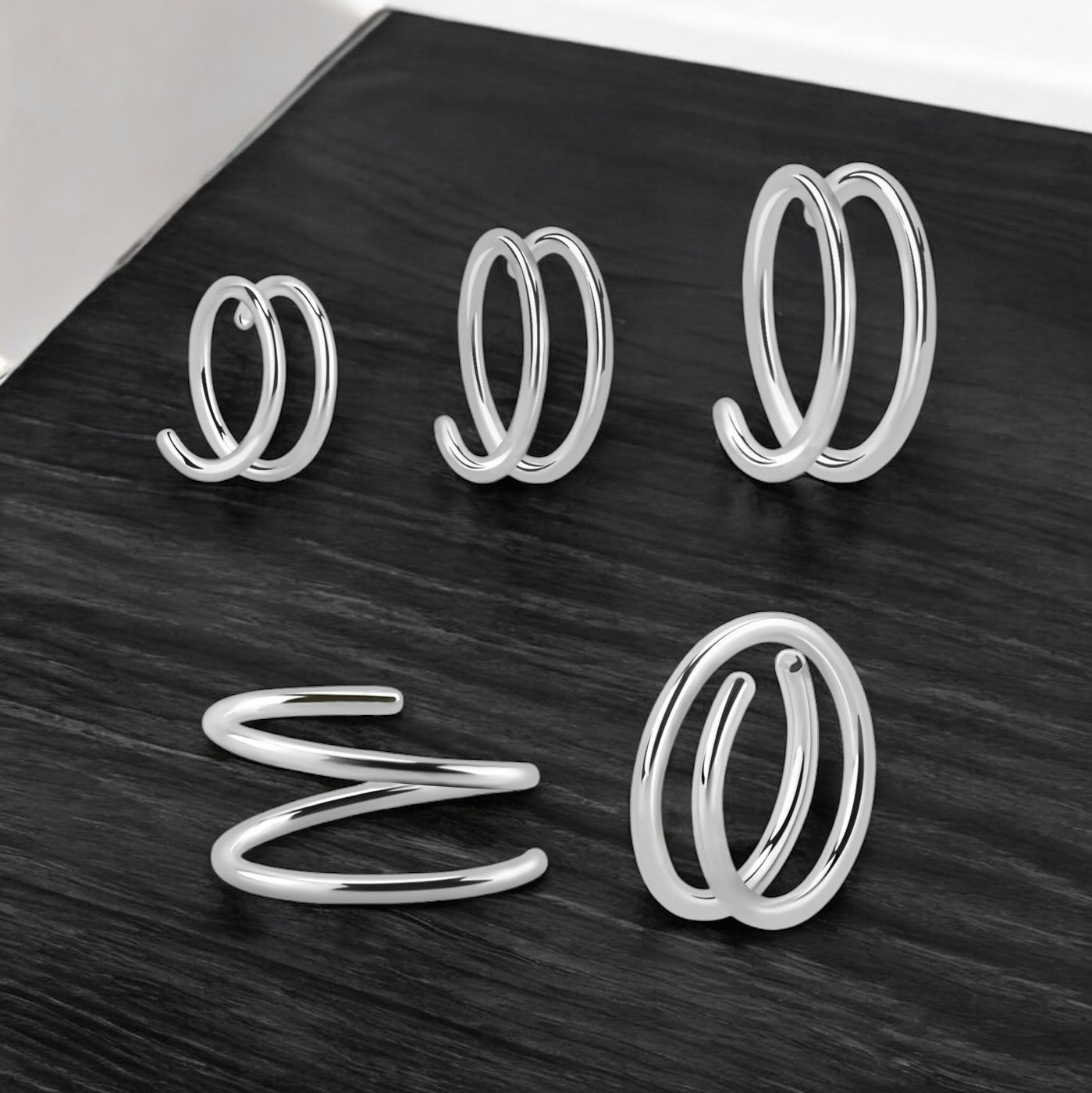 Spiral piercing för näsvinge och öron 0,8mm 925-silver