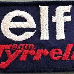 Tygmärke: Elf Team Tyrrell - Ronnies F1-stall 1977, format 7x10 cm