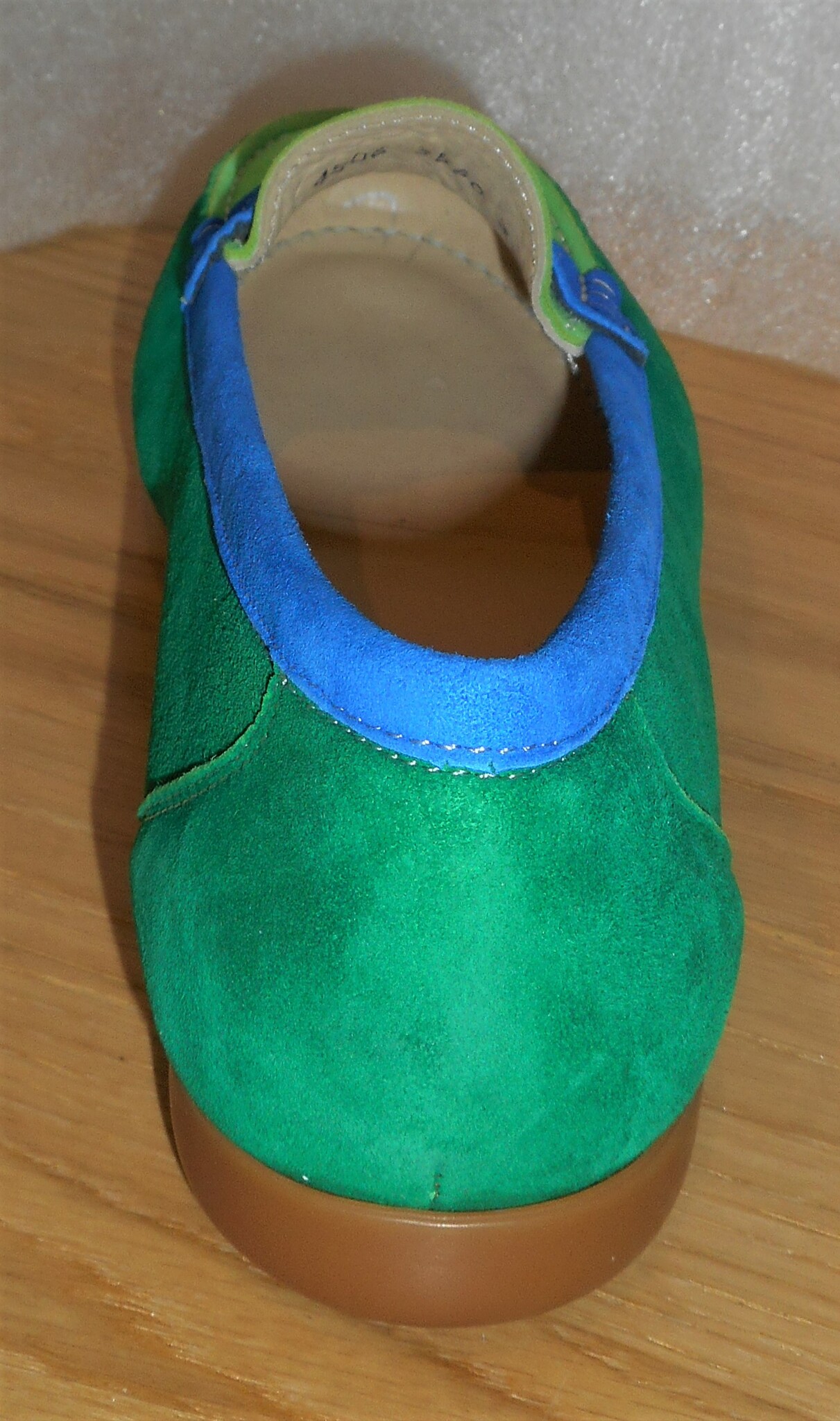 Grön/blå mockasin från Amberone