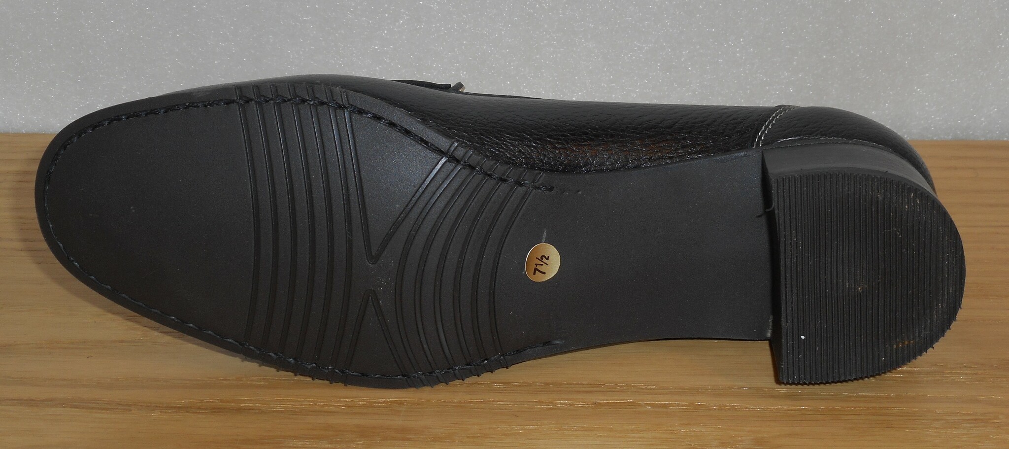 Svart loafer med silverbetsel och naturfärgade dekorsömmar - Amberone