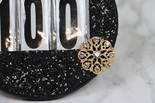 Hulta guld svartglitter